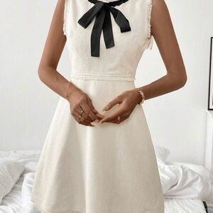 Elegant Cream tweed Sleeveless Dress with Black Bow